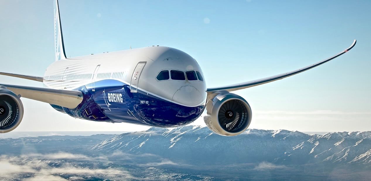 vista frontal del boeing 787 volando con cielo azul